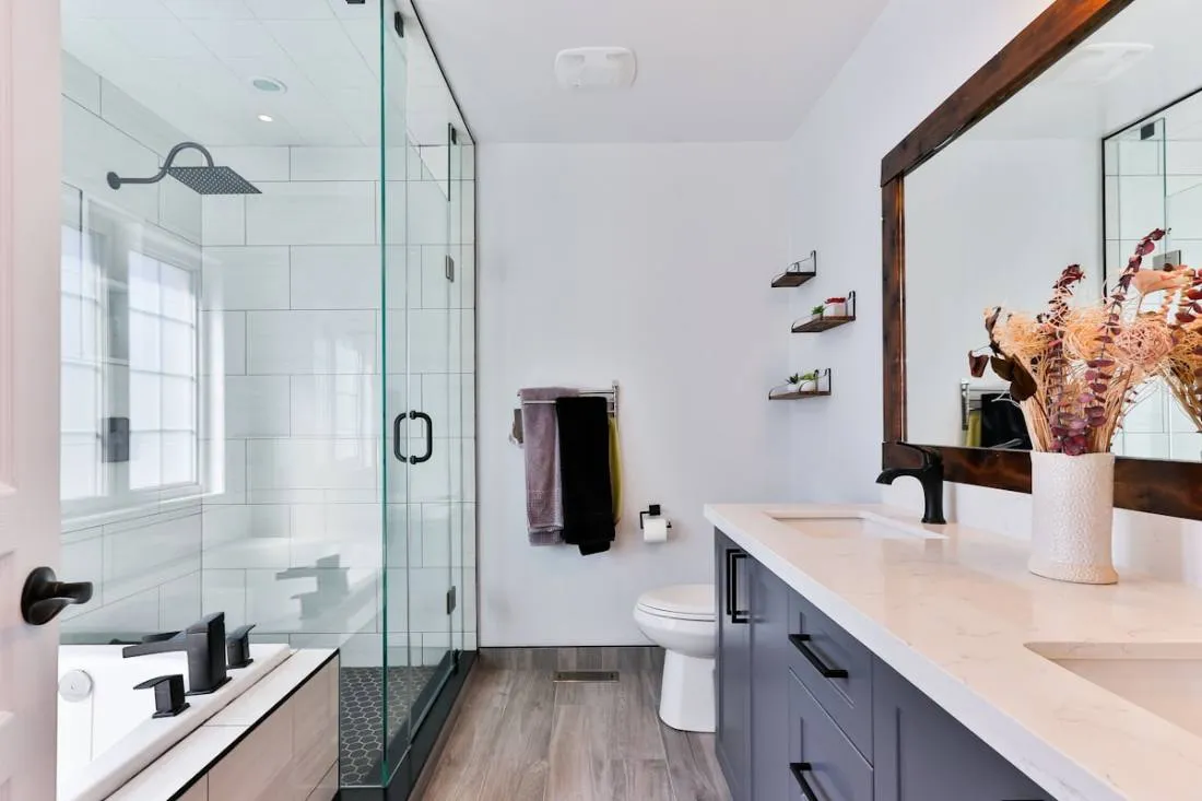Blocked toilet being cleared in a UK bathroom